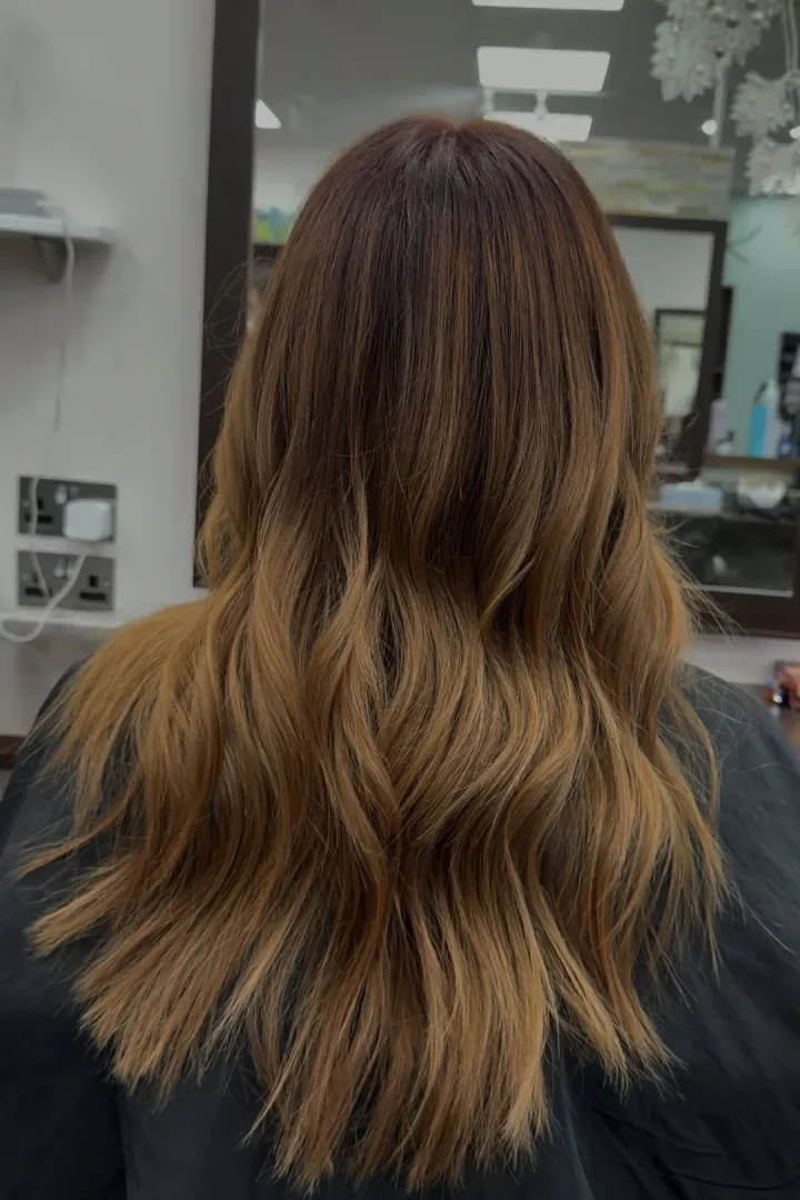 brown and blonde hair of a a woman at a hair salon