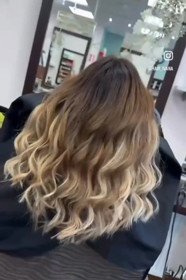 curly wavey hair of a woman from the back