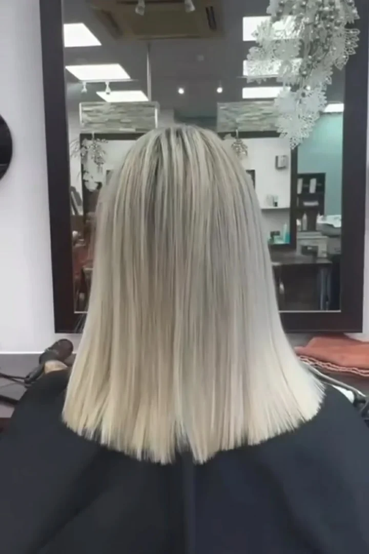 freshly done blond hair of a woman